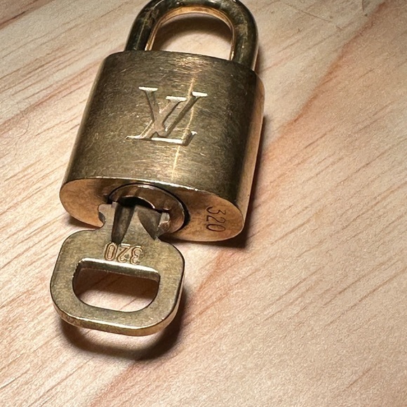 Louis Vuitton Handbags - Authentic LV Lock and Key #320 GOOD condition needs a little ❤️